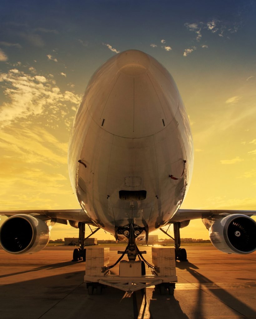 Airplane at sunset - back lit